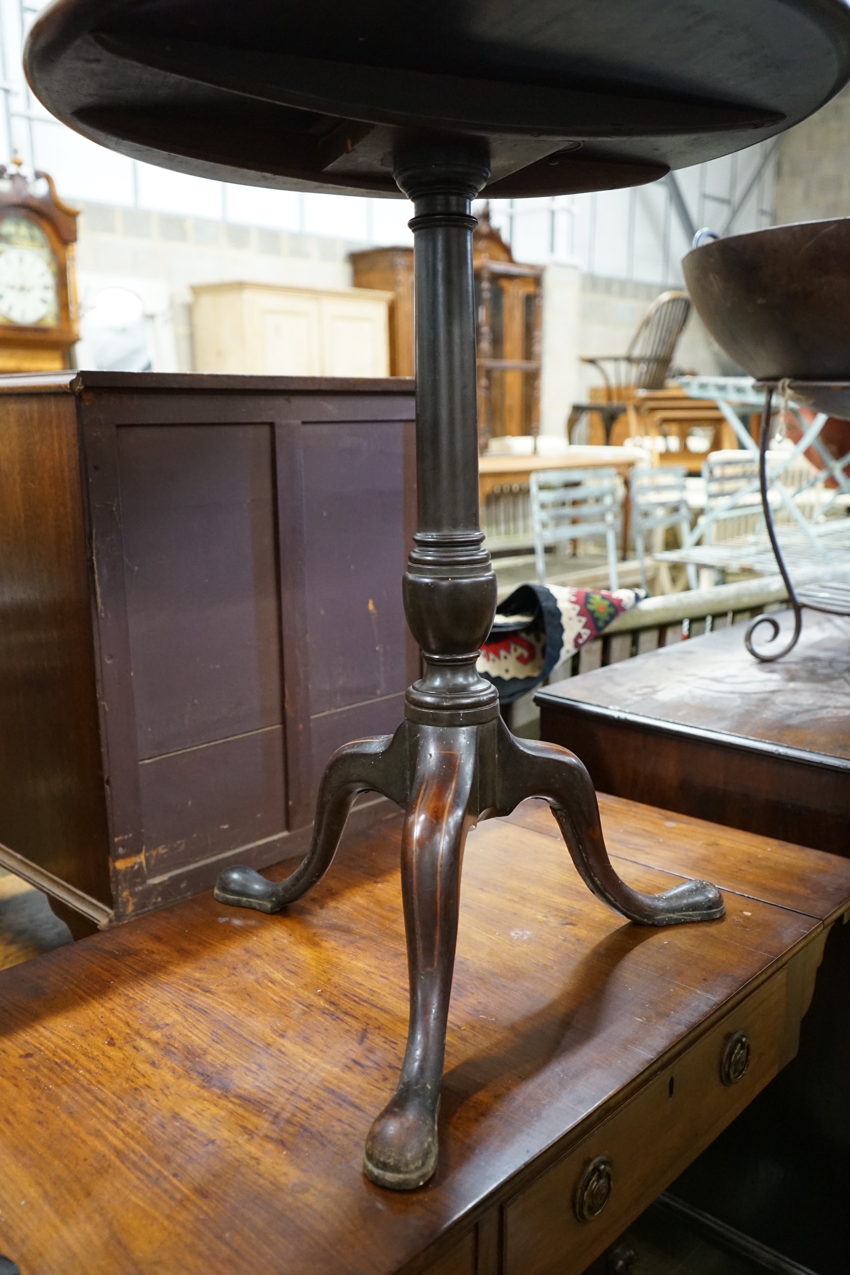 A George III and later circular inlaid mahogany tilt top tripod table, diameter 59cm, height 71cm